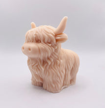 Load image into Gallery viewer, Handmade vegan soaps featuring a large detailed highland cow. crafted with natural French clays, activated charcoal and essential oils. a eco-friendly, zero waste gift that’s cruelty-free, skin-nourishing, and perfect for highland coo lovers and animal themed gifts. small business UK