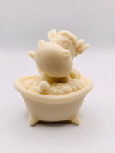Load image into Gallery viewer, Handmade vegan soap featuring a cow in the bath scrubbing his back and packed in beautiful eco friendly packaging. crafted with natural French clays, activated charcoal and essential oils. a eco-friendly, zero waste gift that’s cruelty-free, skin-nourishing, and perfect for cow lovers or animal themed gifts. Small business UK