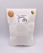 Load image into Gallery viewer, Handmade vegan soaps featuring a detailed peacock, in beautiful eco friendly packaging. crafted with natural French clays, activated charcoal and essential oils. a eco-friendly, zero waste gift that’s cruelty-free, skin-nourishing, the perfect gift for peacock lovers or for animal lovers. small business UK