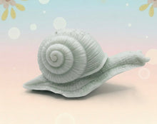 Load image into Gallery viewer, Handmade vegan soaps featuring a detailed snail, in beautiful eco friendly packaging. crafted with natural French clays, activated charcoal and essential oils. a eco-friendly, zero waste gift that’s cruelty-free, skin-nourishing, the perfect gift for snail lovers, gardeners or for animal lovers. small business UK