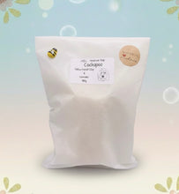 Load image into Gallery viewer, Handmade vegan soaps featuring a large detailed cockapoo dog wrapped in beautiful eco friendly packaging crafted with natural French clays, activated charcoal and essential oils. a eco-friendly, zero waste gift that’s cruelty-free, skin-nourishing, and perfect gift for cockapoo owners, dog lovers and animal themed gifts. small business UK