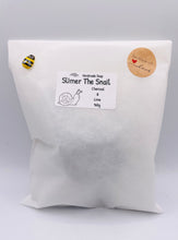 Load image into Gallery viewer, Handmade vegan soaps featuring a detailed snail, in beautiful eco friendly packaging. crafted with natural French clays, activated charcoal and essential oils. a eco-friendly, zero waste gift that’s cruelty-free, skin-nourishing, the perfect gift for snail lovers, gardeners or for animal lovers. small business UK