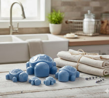 Load image into Gallery viewer, Handmade vegan soaps featuring a set of 5 turtle family soaps and gift boxed in beautiful eco friendly packaging