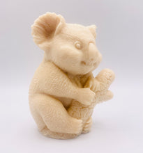 Load image into Gallery viewer, Handmade vegan soaps featuring a chunky koala bear climbing a tree packaged in beautiful eco friendly packaging crafted with natural French clays, activated charcoal and essential oils. a eco-friendly, zero waste gift that’s cruelty-free, skin-nourishing, and perfect for koala bear lovers and animal themed gifts. small business UK
