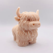 Load image into Gallery viewer, Handmade vegan soaps featuring a large detailed highland cow. crafted with natural French clays, activated charcoal and essential oils. a eco-friendly, zero waste gift that’s cruelty-free, skin-nourishing, and perfect for highland coo lovers and animal themed gifts. small business UK