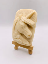 Load image into Gallery viewer, Handmade vegan soaps featuring a unicorn head and wrapped in beautiful eco friendly packaging crafted with natural French clays, activated charcoal and essential oils. a eco-friendly, zero waste gift that’s cruelty-free, skin-nourishing, and perfect gift for unicorn lovers. small business UK