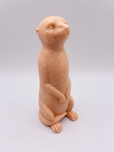 Load image into Gallery viewer, Handmade vegan soaps featuring a cheeky meerkat standing on his back legs. packaged in beautiful eco friendly packaging crafted with natural French clays, activated charcoal and essential oils. a eco-friendly, zero waste gift that’s cruelty-free, skin-nourishing, and perfect for meerkat lovers and animal themed gifts. small business UK