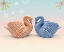 Load image into Gallery viewer, A beautiful handmade vegan soap in the shape of a graceful swan with detailed wing feathers, displayed against a whimsical background for an elegant farmhouse decor gift.