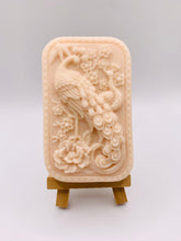 Load image into Gallery viewer, Handmade vegan soaps featuring a detailed peacock, in beautiful eco friendly packaging. crafted with natural French clays, activated charcoal and essential oils. a eco-friendly, zero waste gift that’s cruelty-free, skin-nourishing, the perfect gift for peacock lovers or for animal lovers. small business UK