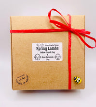 Load image into Gallery viewer, Handmade vegan soap featuring a set of two spring lambs and gift boxed in beautiful eco friendly packaging. crafted with natural French clays, activated charcoal and essential oils. a eco-friendly, zero waste gift that’s cruelty-free, skin-nourishing, and perfect for easter, sheep lovers or animal themed gifts. Small business UK