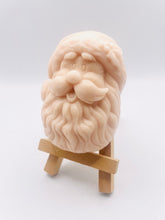 Load image into Gallery viewer, Handmade vegan traditional Santa Claus face shaped vegan soaps. crafted with natural French clays, activated charcoal and essential oils. a eco-friendly, zero waste gift that’s cruelty-free, skin-nourishing, and perfect for Christmas gifts, secret Santa and stocking fillers. Small business UK