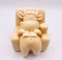 Load image into Gallery viewer, Handmade vegan cow sleeping on the sofa with book and coffee, shaped vegan soaps. crafted with natural French clays, activated charcoal and essential oils. a eco-friendly, zero waste gift that’s cruelty-free, skin-nourishing, and perfect for animal lovers and gifting. small business UK