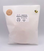 Load image into Gallery viewer, Handmade vegan soaps featuring a llama or alpaca carrying a bouquet of flowers on its back wrapped in beautiful eco friendly packaging crafted with natural French clays, activated charcoal and essential oils. a eco-friendly, zero waste gift that’s cruelty-free, skin-nourishing, and perfect for alpaca or llama gifts and animal themed gifts. small business UK