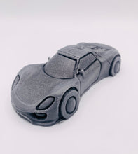 Load image into Gallery viewer, Handmade vegan soaps featuring a sports car wrapped in beautiful eco friendly packaging crafted with natural French clays, activated charcoal and essential oils. a eco-friendly, zero waste gift that’s cruelty-free, skin-nourishing, and perfect gift for sports car lovers and gifts for him. small business UK
