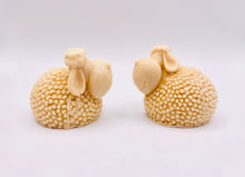 Load image into Gallery viewer, Handmade vegan soap featuring a set of two spring lambs and gift boxed in beautiful eco friendly packaging. crafted with natural French clays, activated charcoal and essential oils. a eco-friendly, zero waste gift that’s cruelty-free, skin-nourishing, and perfect for easter, sheep lovers or animal themed gifts. Small business UK