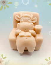 Load image into Gallery viewer, Handmade vegan cow sleeping on the sofa with book and coffee, shaped vegan soaps gift boxed. crafted with natural French clays, activated charcoal and essential oils. a eco-friendly, zero waste gift that’s cruelty-free, skin-nourishing, and perfect for animal lovers and gifting. small business UK