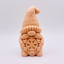 Load image into Gallery viewer, Handmade vegan soaps featuring a christmas gnome holding a snowflake in beautiful eco friendly packaging crafted with natural French clays, activated charcoal and essential oils. a eco-friendly, zero waste gift that’s cruelty-free, skin-nourishing, and perfect for gnome lovers and christmas themed gifts. small business UK
