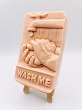 Load image into Gallery viewer, Our unique “Wash Me” soap features a playful design of a pair of hands washing under a tap, complete with the words “WASH ME” imprinted at the bottom. Made from 100% vegan, cruelty-free ingredients, our soap is as kind to the planet as it is to your skin. Customise your bar by choosing your favourite colour and essential oil.
zero waste gifts UK. handmade gifts UK. Handmade home style UK. BrIrish made. Handmade UK. Modern gifts UK. Vegan soap UK.
