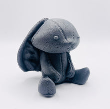 Load image into Gallery viewer, Handmade vegan soaps featuring an adorable rabbit with big floppy ears and stitching detail, in beautiful eco friendly packaging. crafted with natural French clays, activated charcoal and essential oils. a eco-friendly, zero waste gift that’s cruelty-free, skin-nourishing, the perfect gift for easter or for animal lovers. small business UK