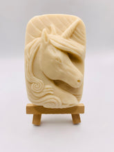 Load image into Gallery viewer, Handmade vegan soaps featuring a unicorn head and wrapped in beautiful eco friendly packaging crafted with natural French clays, activated charcoal and essential oils. a eco-friendly, zero waste gift that’s cruelty-free, skin-nourishing, and perfect gift for unicorn lovers. small business UK