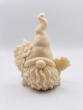 Load image into Gallery viewer, Handmade vegan soaps featuring a gorgeous gnome holding a bunch of flowers in one hand and waving with the other hand. beautiful eco friendly packaging. crafted with natural French clays, activated charcoal and essential oils. a eco-friendly, zero waste gift that’s cruelty-free, skin-nourishing, and perfect for gnome lovers and gifting. UK Small Business
