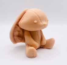 Load image into Gallery viewer, Handmade vegan soaps featuring an adorable rabbit with big floppy ears and stitching detail, in beautiful eco friendly packaging. crafted with natural French clays, activated charcoal and essential oils. a eco-friendly, zero waste gift that’s cruelty-free, skin-nourishing, the perfect gift for easter or for animal lovers. small business UK