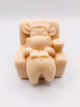 Load image into Gallery viewer, Handmade vegan cow sleeping on the sofa with book and coffee, shaped vegan soaps. crafted with natural French clays, activated charcoal and essential oils. a eco-friendly, zero waste gift that’s cruelty-free, skin-nourishing, and perfect for animal lovers and gifting. small business UK