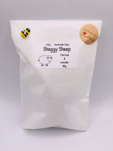 Load image into Gallery viewer, Handmade vegan soaps featuring a cute shaggy sheep, packaged in beautiful eco friendly packaging. crafted with natural French clays, activated charcoal and essential oils. a eco-friendly, zero waste gift that’s cruelty-free, skin-nourishing, the perfect gift for sheep lovers and animal lovers. small business UK