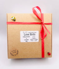 Load image into Gallery viewer, Handmade vegan soaps featuring a set of two love birds . gift boxed in beautiful eco friendly packaging. crafted with natural French clays, activated charcoal and essential oils. a eco-friendly, zero waste gift that’s cruelty-free, skin-nourishing, the perfect gift for bird lovers and animal lovers. UK Small Business