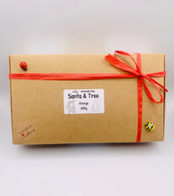 Load image into Gallery viewer, Christmas Gift | Secret Santa Gift | Stocking Filler | Father Christmas Gift | Santa Claus Gift | Christmas Tree Gift | Santa & Christmas Tree Vegan Soap Gift Set -GIFT BOXED 
This adorable Christmas gift set is available in your choice of Santa colour and essential oil.  This soap is gift boxed ready to give your loved one or as a cheeky Christmas treat to yourself! 
Set contains:
1 x Santa Soap (colour changeable) 100g
1 x Christmas Tree Soap 100g (Green French Clay)