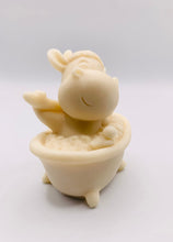 Load image into Gallery viewer, Handmade vegan soap featuring a cow in the bath scrubbing his back and packed in beautiful eco friendly packaging. crafted with natural French clays, activated charcoal and essential oils. a eco-friendly, zero waste gift that’s cruelty-free, skin-nourishing, and perfect for cow lovers or animal themed gifts. Small business UK