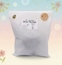 Load image into Gallery viewer, Handmade vegan soaps featuring a detailed snail, in beautiful eco friendly packaging. crafted with natural French clays, activated charcoal and essential oils. a eco-friendly, zero waste gift that’s cruelty-free, skin-nourishing, the perfect gift for snail lovers, gardeners or for animal lovers. small business UK