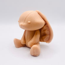 Load image into Gallery viewer, Handmade vegan soaps featuring an adorable rabbit with big floppy ears and stitching detail, in beautiful eco friendly packaging. crafted with natural French clays, activated charcoal and essential oils. a eco-friendly, zero waste gift that’s cruelty-free, skin-nourishing, the perfect gift for easter or for animal lovers. small business UK