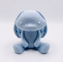 Load image into Gallery viewer, Handmade vegan soaps featuring an adorable rabbit with big floppy ears and stitching detail, in beautiful eco friendly packaging. crafted with natural French clays, activated charcoal and essential oils. a eco-friendly, zero waste gift that’s cruelty-free, skin-nourishing, the perfect gift for easter or for animal lovers. small business UK
