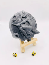 Load image into Gallery viewer, Handmade vegan soap featuring a witch flying on her broomstick and packaged in beautiful eco friendly packaging. crafted with natural French clays, activated charcoal and essential oils. a eco-friendly, zero waste gift that’s cruelty-free, skin-nourishing, and perfect for horror lovers and halloween themed gifts. Small business UK
