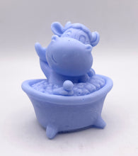 Load image into Gallery viewer, Handmade vegan soap featuring a cow in the bath scrubbing his back and packed in beautiful eco friendly packaging. crafted with natural French clays, activated charcoal and essential oils. a eco-friendly, zero waste gift that’s cruelty-free, skin-nourishing, and perfect for cow lovers or animal themed gifts. Small business UK