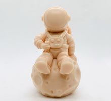 Load image into Gallery viewer, Space Gift | Astronaut Gift | NASA Gift | Astronomy| Astronaut & Moon Vegan Soap Experience out-of-this-world cleanliness with this astronaut casually sitting on the moon! Available in your choice of colour and essential oil. Eco conscious gift. Vegan and cruelty free. All soaps are made with natural clays and essential oils to gently cleanse and nourish your skin. eco-friendly packaging. zero waste gifts. modern gift ideas. handmade home style. eco conscious home. green living.