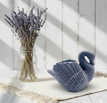 Load image into Gallery viewer, A beautiful handmade vegan soap in the shape of a graceful swan with detailed wing feathers, displayed against a whimsical background for an elegant farmhouse decor gift.