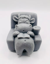 Load image into Gallery viewer, Handmade vegan cow sleeping on the sofa with book and coffee, shaped vegan soaps gift boxed. crafted with natural French clays, activated charcoal and essential oils. a eco-friendly, zero waste gift that’s cruelty-free, skin-nourishing, and perfect for animal lovers and gifting. small business UK
