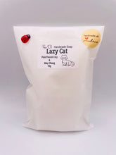 Load image into Gallery viewer, Handmade vegan soaps featuring a lazy cat, in beautiful eco friendly packaging. crafted with natural French clays, activated charcoal and essential oils. a eco-friendly, zero waste gift that’s cruelty-free, skin-nourishing, the perfect gift for cat lovers or for animal lovers. small business UK