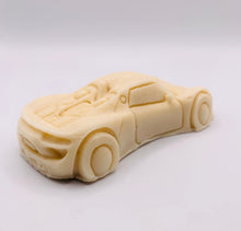 Load image into Gallery viewer, Car Gift | Fathers Day Gift | Gift for Him | Sports Car Vegan Soap 
This vegan, cruelty-free soap is designed for car lovers and speed enthusiasts! . Made with your choice of French clay and essential oil, it delivers a smooth, deep clean. 
Perfect for teenagers, Father’s Day, birthdays, or just because!