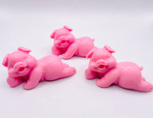 Load image into Gallery viewer, Handmade vegan soaps featuring a set of three cute laughing pigs, gift boxed in beautiful eco friendly packaging. crafted with natural French clays, activated charcoal and essential oils. a eco-friendly, zero waste gift thatās cruelty-free, skin-nourishing, and perfect for animal lovers, pig lovers and teacher appreciation gifts. small business UK