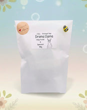 Load image into Gallery viewer, Handmade vegan soaps featuring a llama or alpaca wearing sunglasses wrapped in beautiful eco friendly packaging crafted with natural French clays, activated charcoal and essential oils. a eco-friendly, zero waste gift that’s cruelty-free, skin-nourishing, and perfect for alpaca or llama gifts and animal themed gifts. small business UK