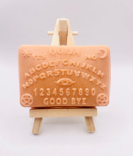 Load image into Gallery viewer, Ouija board design handmade vegan soap. Available in your choice of colour of French clay and essential oil. Perfect Halloween gift. Wrapped in beautiful eco friendly packaging. Small business UK