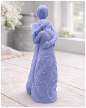 Load image into Gallery viewer, handmade vegan soap, sculpted as a mother and daughter in a tender standing embrace, featuring an intricate embossed floral and vine pattern on their dresses.