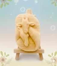 Load image into Gallery viewer, Handmade vegan soaps featuring two nuzzling giraffes in beautiful eco friendly packaging. crafted with natural French clays, activated charcoal and essential oils. a eco-friendly, zero waste gift that’s cruelty-free, skin-nourishing, the perfect gift for giraffe lovers, or for animal lover gifts. small business UK