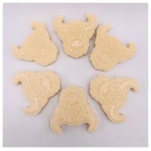 Load image into Gallery viewer, Handmade vegan soaps featuring a set of six mini highland cow soaps gift boxed in beautiful eco friendly packaging. crafted with natural French clays, activated charcoal and essential oils. a eco-friendly, zero waste gift that’s cruelty-free, skin-nourishing, and perfect for highland coo lovers or animal themed gifts. Small business UK