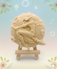 Load image into Gallery viewer, Witch flying on her broomstick with the moon behind her. Handmade vegan and cruelty free soap.