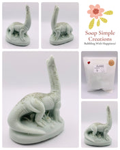 Load image into Gallery viewer, Handmade vegan Brontosaurus dinosaur shaped vegan soaps. crafted with natural French clays, activated charcoal and essential oils. a eco-friendly, zero waste gift that’s cruelty-free, skin-nourishing, and perfect for dragon dinosaur lovers and gifting.