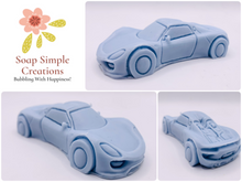 Load image into Gallery viewer, Car Gift | Fathers Day Gift | Gift for Him | Sports Car Vegan Soap 
This vegan, cruelty-free soap is designed for car lovers and speed enthusiasts! . Made with your choice of French clay and essential oil, it delivers a smooth, deep clean. 
Perfect for teenagers, Father’s Day, birthdays, or just because!